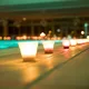 Lichterschwimmen im Wellenbad am Meer